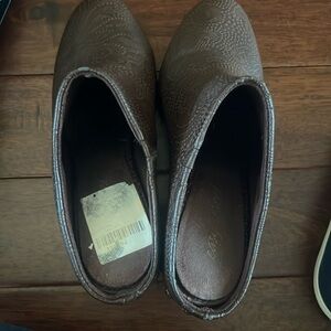 Brown mules with fancy metal studs